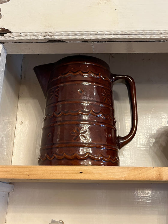 light brown stone ware pitcher